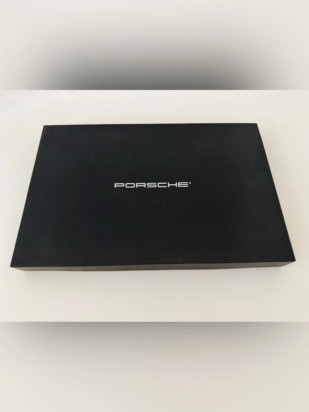 Porsche New Pen with book in box Case with Silver Logo.